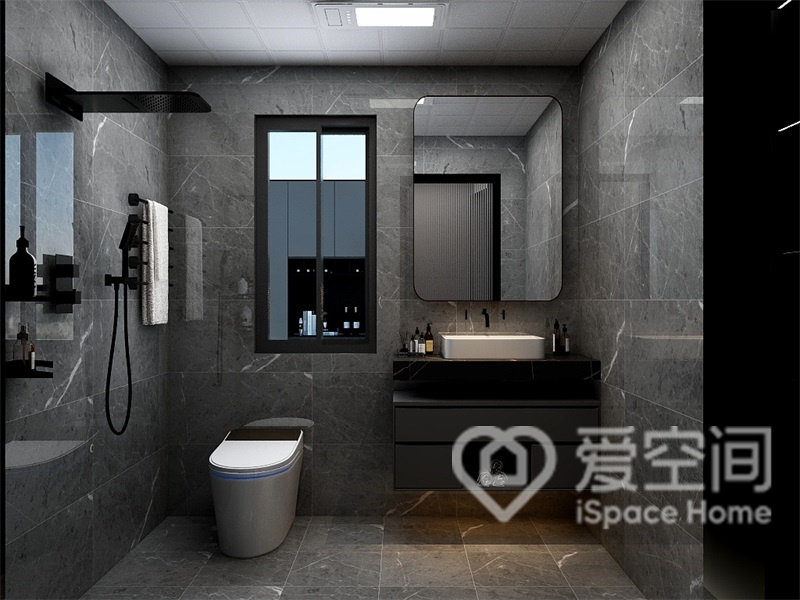 为了突出高档性，卫生间选择了灰色的瓷砖设计，耐看又便于打理。