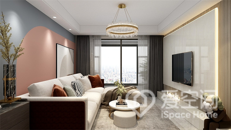 客厅设计雅致，蓝色与粉色的背景墙设计，营造出休闲放松的空间氛围。