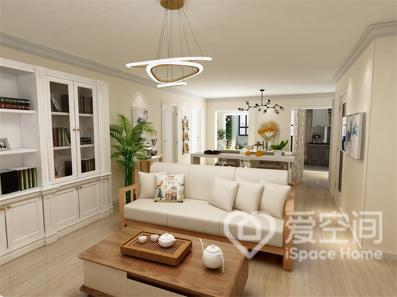 客厅的茶几和布艺沙发风格一致，整体的视觉效果清新自然，仿佛能够嗅到一种简洁的气息。