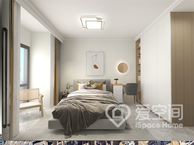 次臥背景墻采用留白的手法來設計，軟裝增加了空間的層次感，帶來舒適的視覺體驗。
