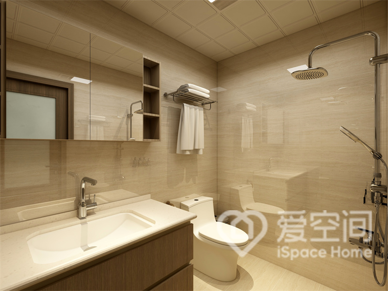 卫生间整体为米色基调，融入白色洁具色彩点缀，提升了视觉暖度。