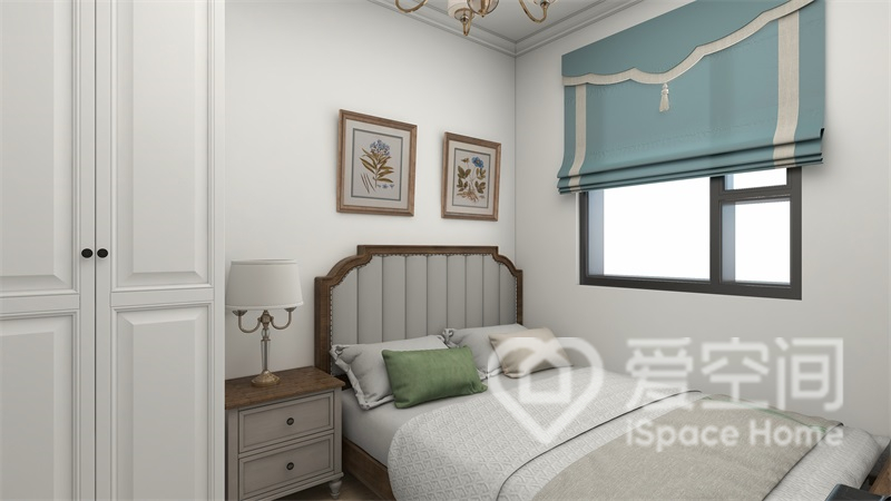 客臥床體靠墻放置，令空間面積得到拓展，白色衣柜與墻面顏色高度統一，增加了空間的明亮感。