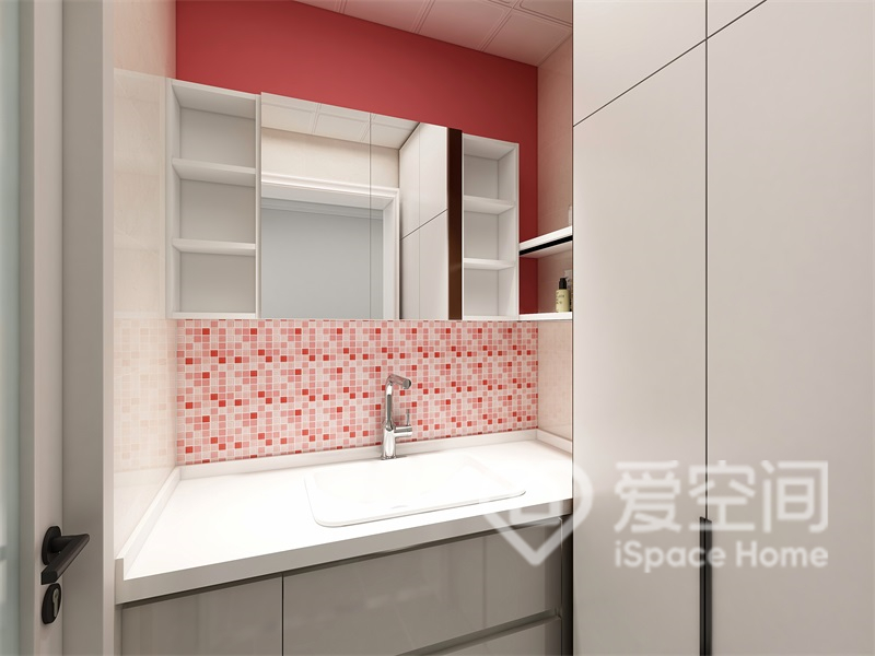 紅色元素的融入展示出衛浴空間的時尚感，白色儲物柜滿足了空間的收納。