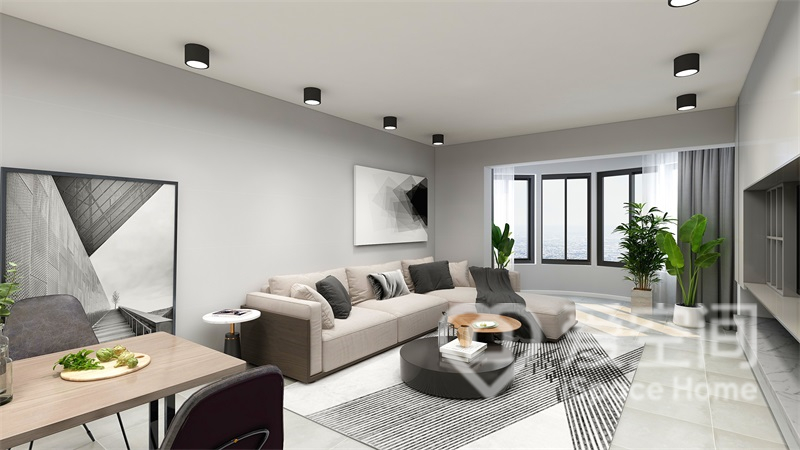 布艺沙发集美观性与功能性为一体，搭配沉稳的黑褐色抱枕，淬炼出客厅的宁静之感。