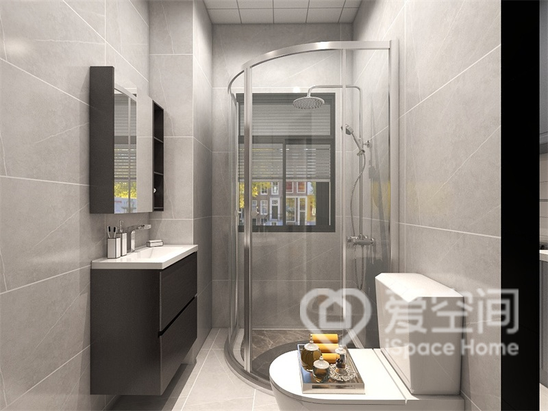 灰色基調下，衛生間采用了干濕分離，懸空式洗手臺避免了衛生死角。