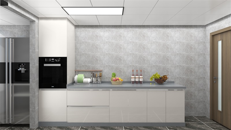 廚房空間以灰白色為主，烤漆材質櫥柜便于整理，也顯得空間更加安靜。