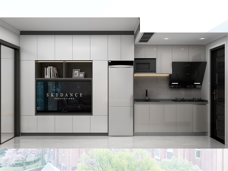 廚房與電視墻銜接設計，增大了空間利用率，白色與米色的搭配，也令立面顯得干凈雅致。