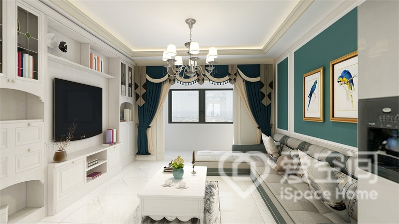 客厅空间以灰白色为背景，融入蓝色色块后，充满个性雅致的氛围。