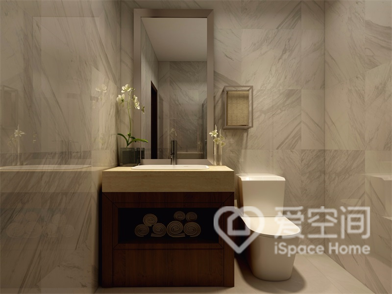 大理石的鋪貼讓衛浴空間更加靜謐，洗手臺精致素雅，體現著生活的重重美好。
