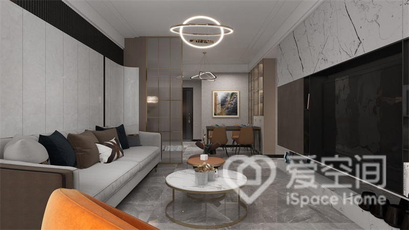 客厅采用灰色的主沙发搭配大理石茶几，背景墙以简约造型设计，给人稳重舒适的感觉。