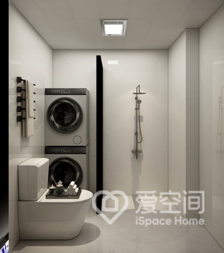 衛生間采用了干濕分離設計，背景顏色以米色為主，融入了白色潔具和洗衣機之后，空間顯得更加的具有高品質。