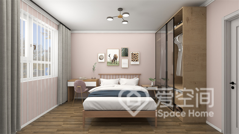 粉色背景墻點綴了次臥空間，原木雙人床的加入令空間靜謐簡約，衣柜兼容并蓄，素雅大氣。