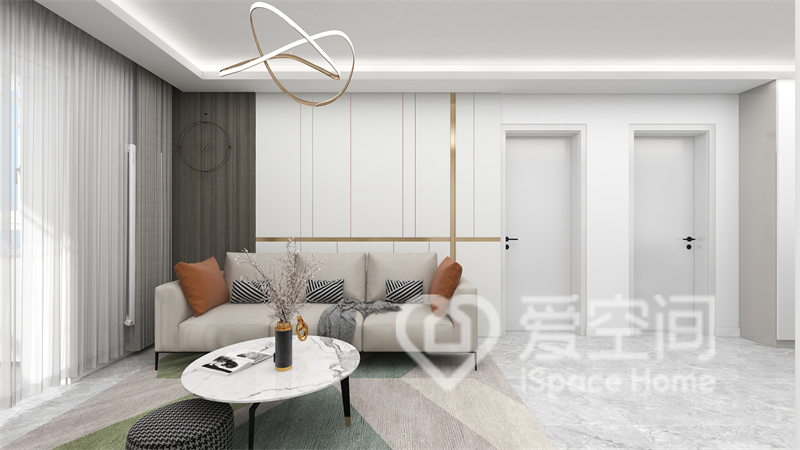 客厅选择了中性色调设计，米色沙发凸显北欧格调，暖色软装展示出空间的纯粹。