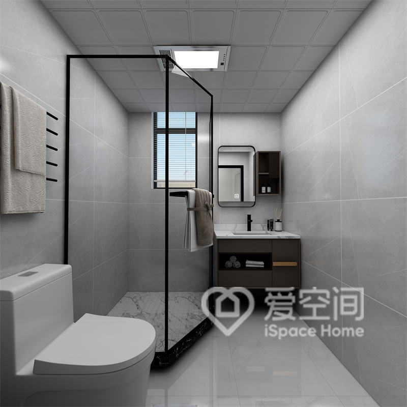 衛浴間采用灰白配色設計，給人安全感和從容感，定制洗手臺沉穩不失靈動，干濕分離提升了層次。