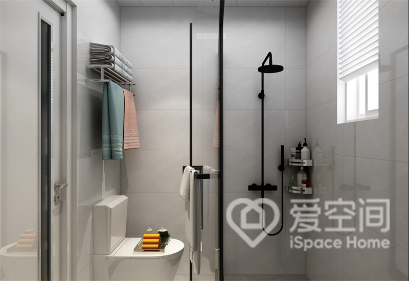 卫生间以白色砖面为格调，干湿分离后令空间多了一些线条感，展现出新中式的简约意蕴。