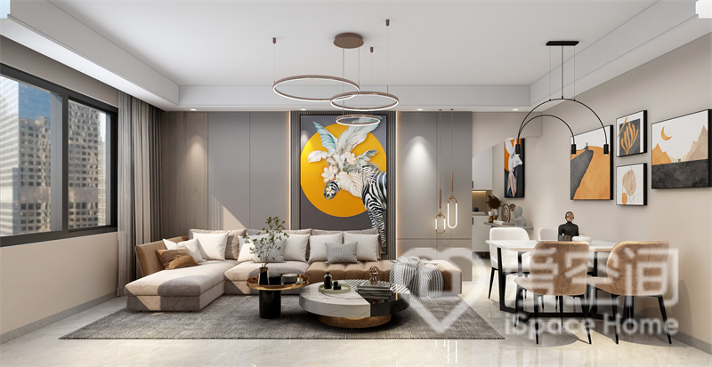 大地色护墙板给人以纯净美好的视觉感受，搭配布艺沙发，客厅空间格调高雅，艺术挂画为空间调性增色不少。
