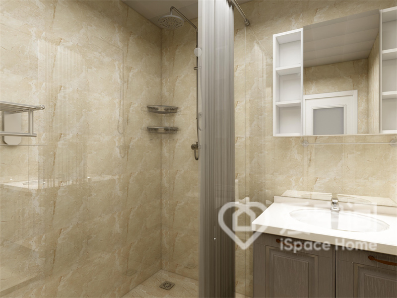 卫生间地面和墙面用料相一致，温馨舒适，浴帘作为空间隔断，无形中为空间增添了几分灵活的气息。