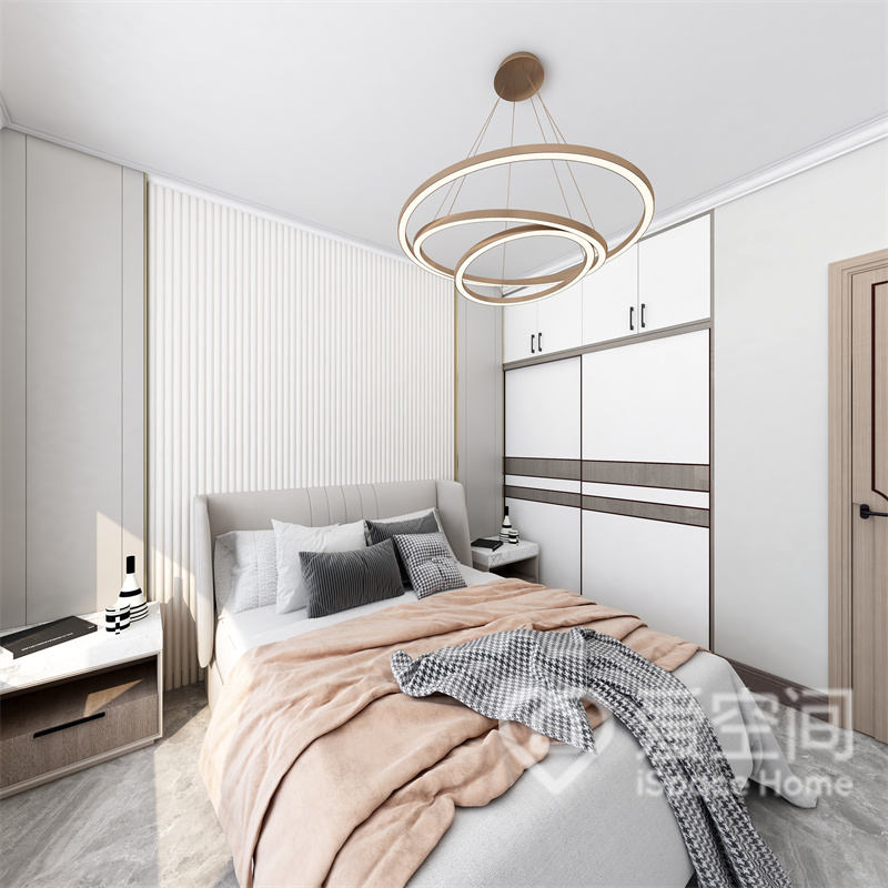 白色背景搭配简洁的双人床，简约的造型充满自然质感，整体空间舒适温馨的氛围，营造出有利睡眠的空间。