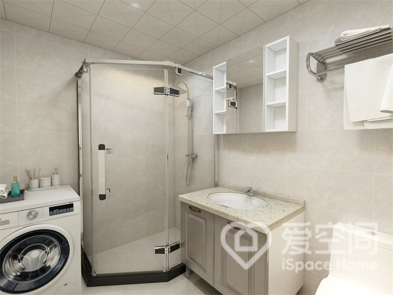 卫生间以米色为背景，做个干湿分离设计，空间动线实用性强，洗衣机的融入提升了卫生间的功能性。