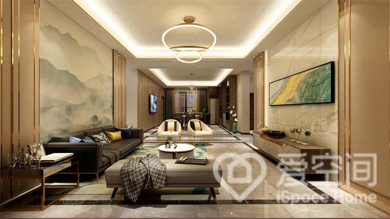 客厅以现代简约手法打造，整体以香槟色作为基调，室内简约而平静，水墨背景贯穿空间，增加了柔情色彩。
