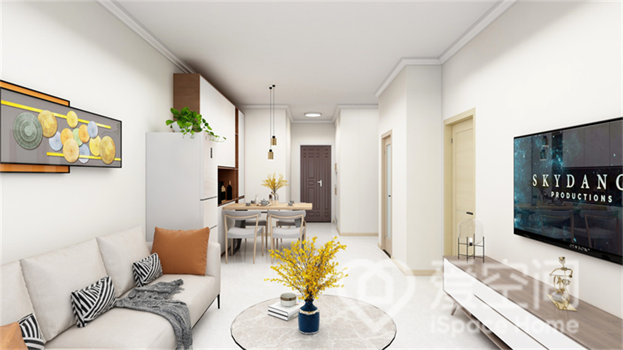 白色的客厅空间营造出怡情养心的居室环境，现代饰品的摆设，勾勒出一个极具格调的客厅氛围。