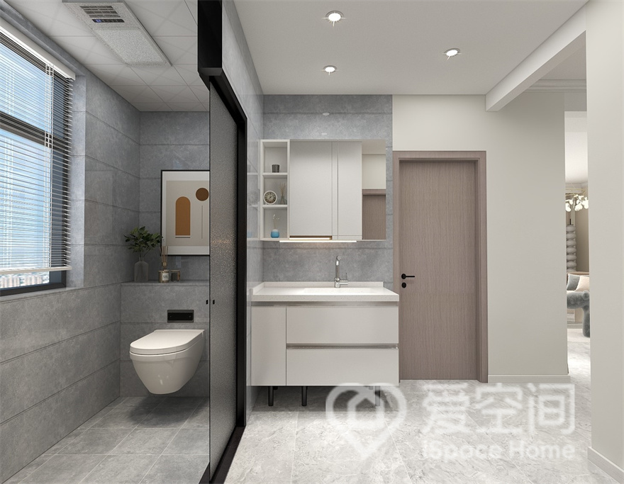 卫生间采用了干湿分离设计，灰色与白色的搭配带来精致的潮流感，赋予了空间独特的灵魂。