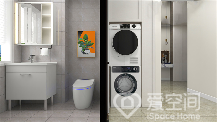 卫生间的色调是纯净的灰白色，智能静音马桶科技感十足，洗衣机和烘干机放置在卫生间外侧，方便日常使用。