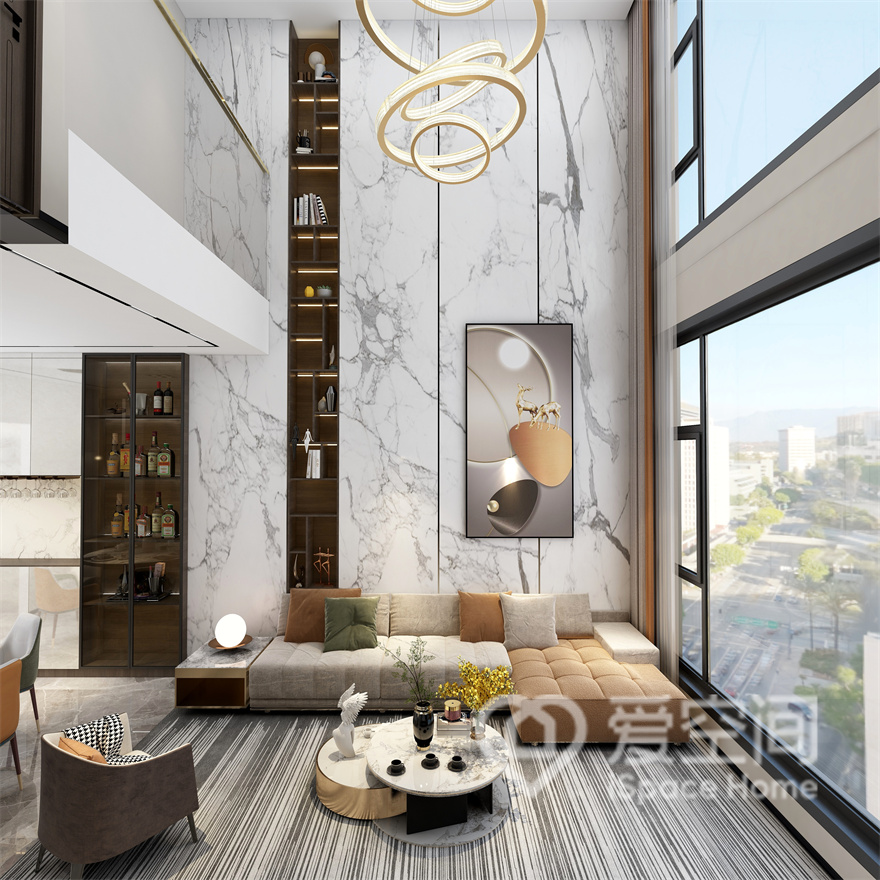 挑高的设计增加了客厅空间的端庄感，自然光线、家具和光影在此融为一体，赋予了高品质的生活享受。