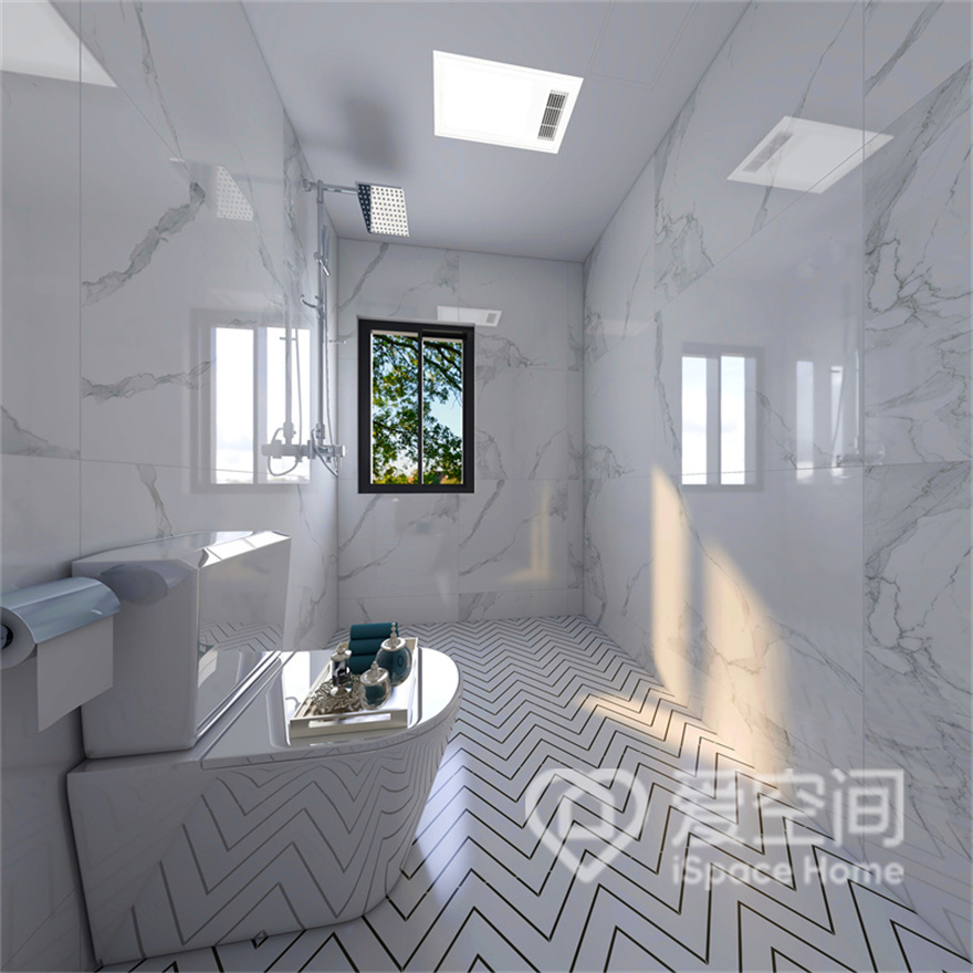 在光影斑驳的卫浴空间中，大理石墙面塑造出平和而包容的姿态，地面艺术砖面增加了时尚感。