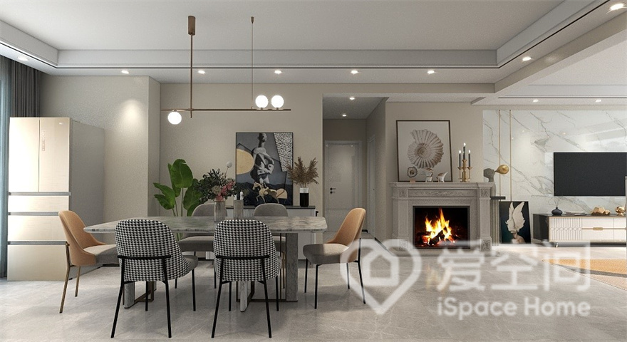 餐厅与客厅一体化设计，相连的空间让视觉效果更显开阔与大气，餐桌椅精简个性，美观与实用兼具。