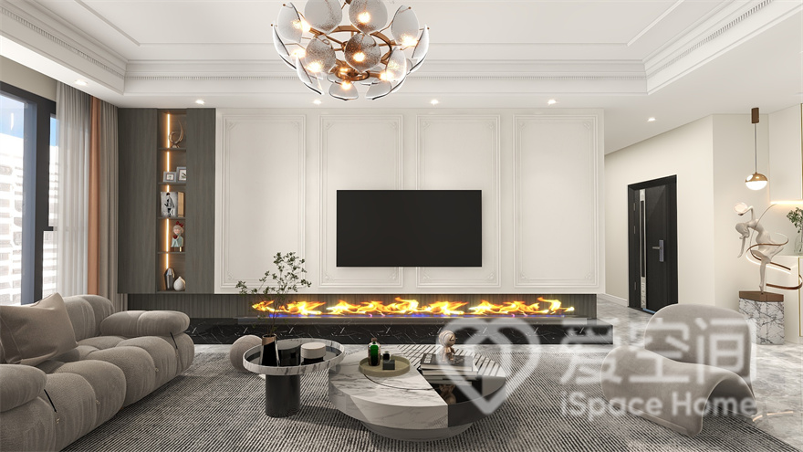 设计师以精炼的极具造型进行融合，打造出一个宁静致远的客厅空间，电视墙的设计塑造出精致的生活氛围。