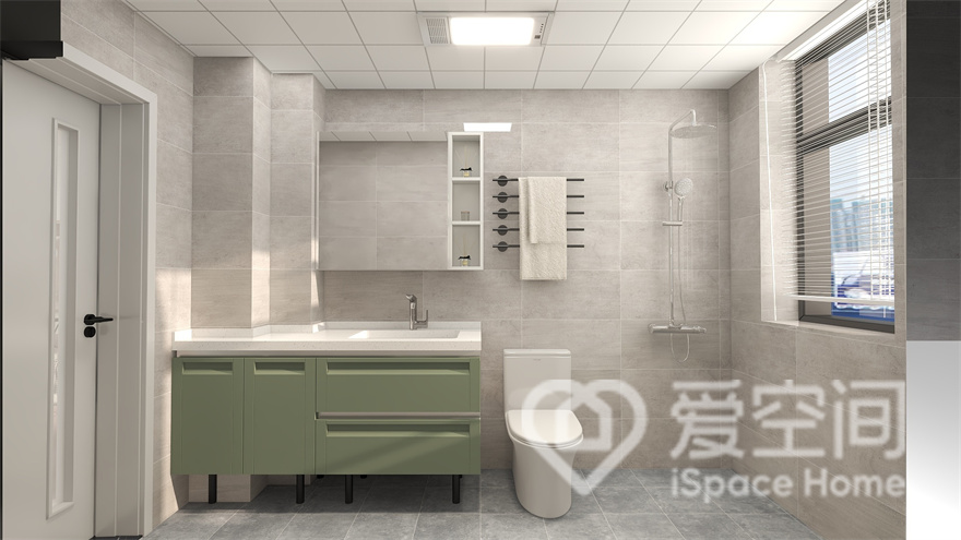 卫生间米白色背景墙与果木绿家具搭配，打造出一个舒适与宁静的卫浴环境，空间动线规划有序。