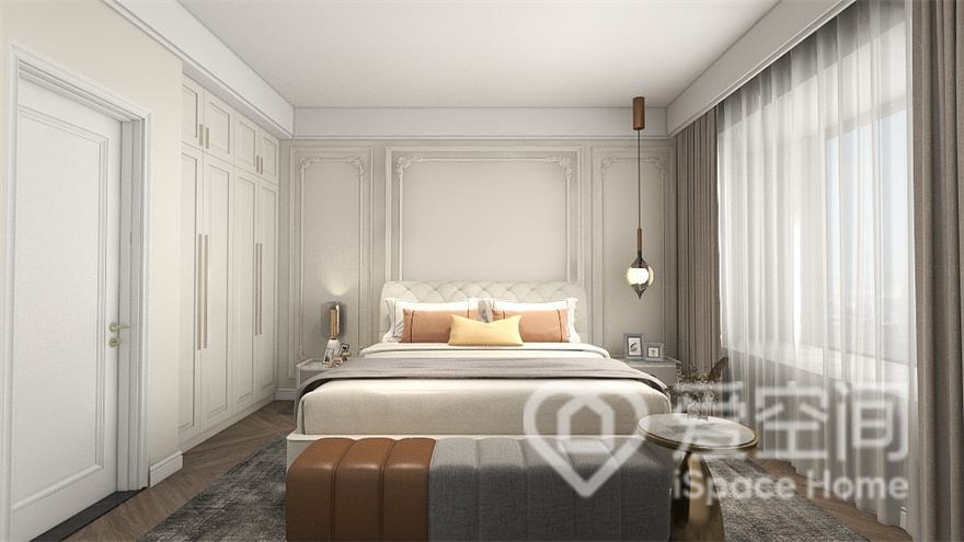次臥空間簡繁相適，不同材質的家具構造出張弛有度的休憩空間，簡單且不失優雅的格調。