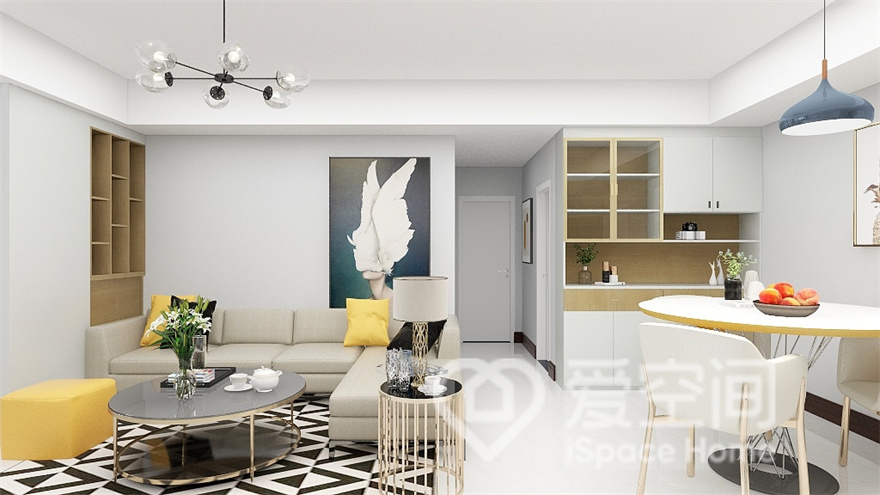 客厅与餐厅一体化设计，设计师在白色的单调中加以米色皮质沙发，并利用黄色软装提升了空间的活跃之感。