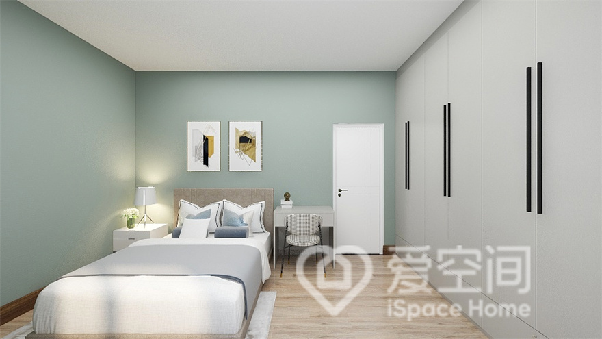 将薄荷绿融入墙面颜色释放出清新活力的空间氛围，提高了通透感，隐形衣柜保持了空间的干净与整洁。