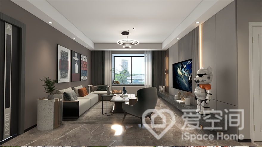 较好的采光让客厅空间更加的通透，米咖色背景凸显端庄的空间气质，搭配色调稳重的家具，整体显得很安静。