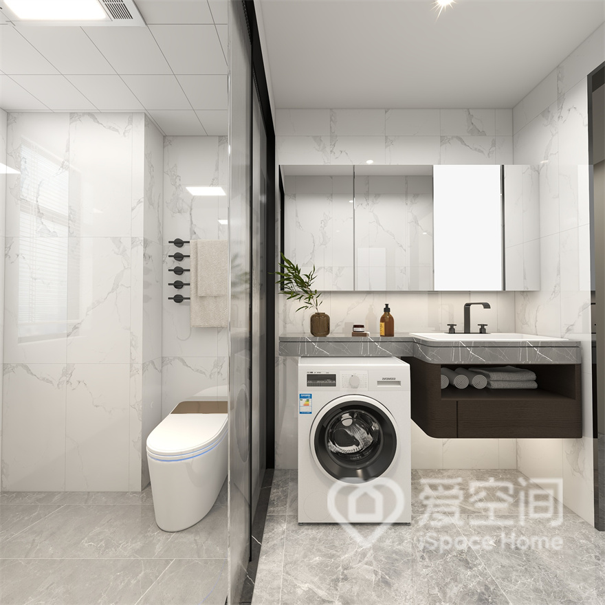 卫生间做了干湿分离设计，搭配定制的大理石洗手台，打造出一个优雅高级又方便的清洁的生活空间。