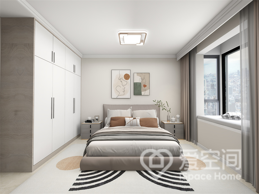 入墙式的大衣柜让次卧卧室空间得到有效利用，同时塑造出设计的整体感，让生活更加从容、便捷。