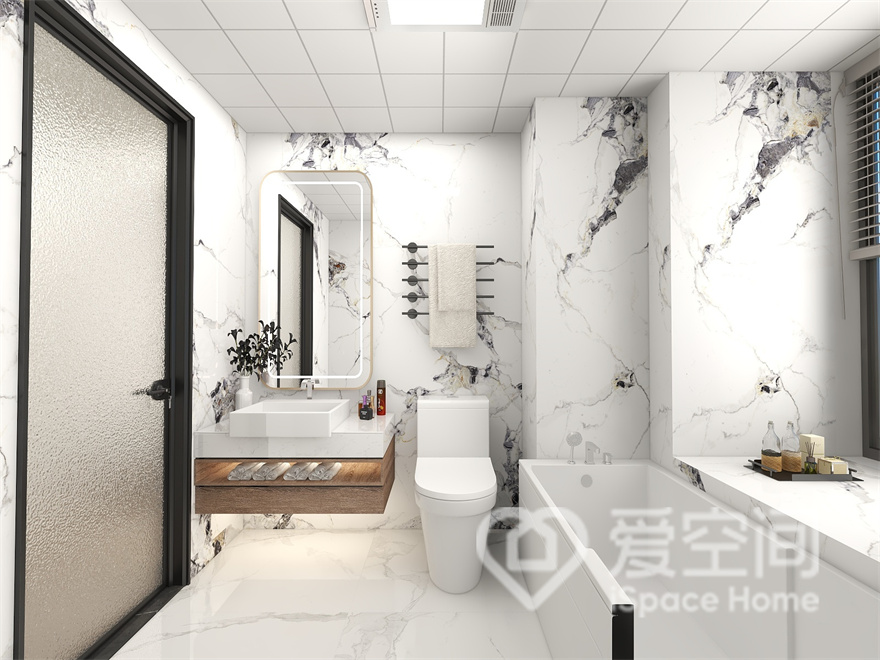 卫浴间明快简约，大理石砖面肌理自然，富有艺术性，配以白色洁具装饰其中，塑造出温馨自在感。