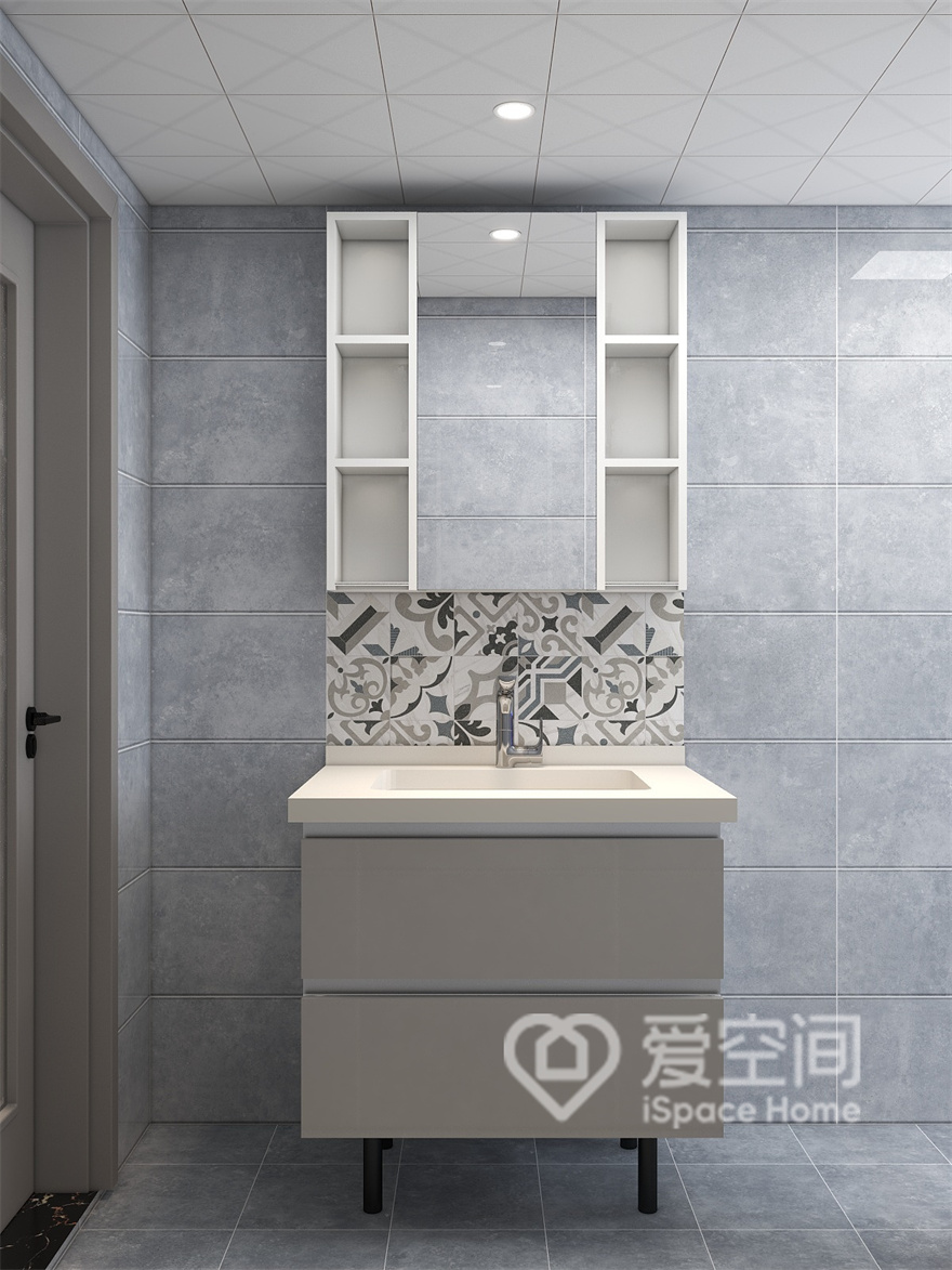 卫生间的立面给人带来舒适的感觉，镜柜、花砖和洗手台形成一体设计，显得高级又耐看。