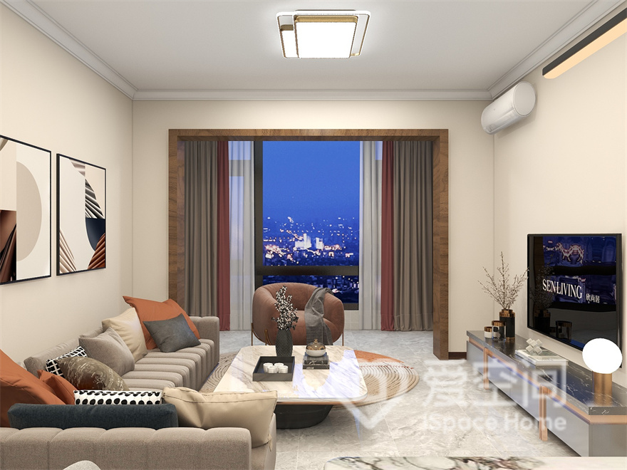 客厅空间采用暖色调为底色，呈现出一个温暖的空间，家具造型简单纯粹，视觉效果十分舒适。