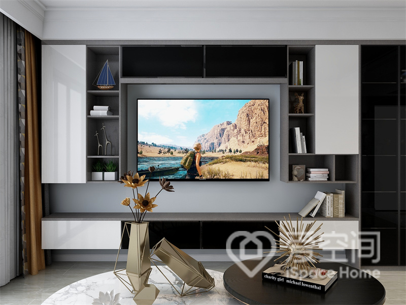 电视墙诠释出空间的美学尺度，灰色立面中加入收纳柜，满足了客厅的储物需求，也丰富了背景的层次感。