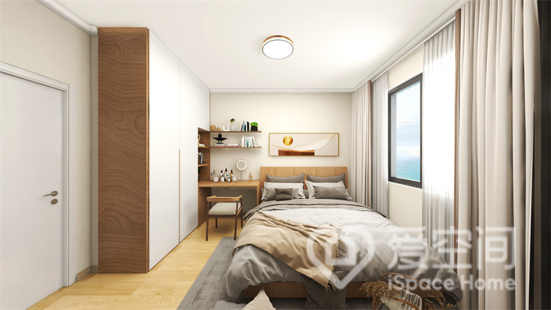 白色空间很有简约气质，灰白色床品营造出舒适惬意的睡眠氛围，定制衣柜可多功能使用。